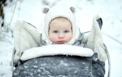 Portrait of cute girl in snow