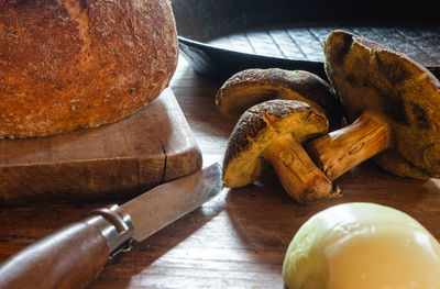 High angle view of bread on cutting board