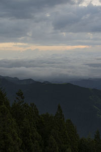 Scenic view of mountains against sky during sunset