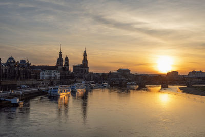 Germany, saxony, dresden,waterfront of historic old town at sunset