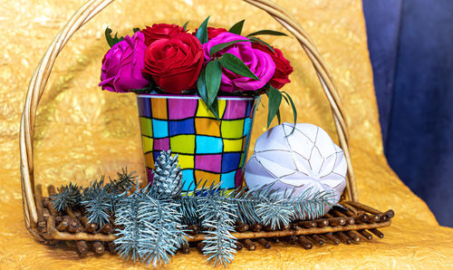 Close-up of multi colored flowers on table