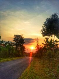 Empty road at sunset