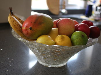 Close-up of fruits in plate on table