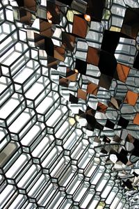 Low angle view of patterned glass ceiling at harpa