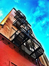 Low angle view of building against blue sky