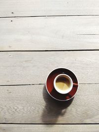 High angle view of coffee cup on table