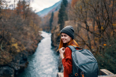 Young woman looking at camera during winter