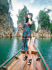 Portrait of young woman in water