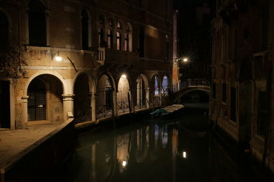 Illuminated buildings in city at night