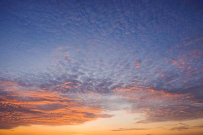 Low angle view of clouds in sky during sunset