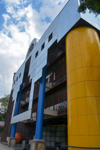 Low angle view of modern building against sky