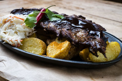 Close-up of food served on table