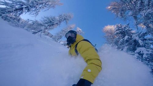 People on snow covered landscape