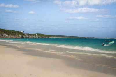 Scenic view of beach against sky