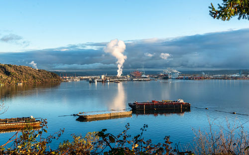 Steam rises at the port of tacoma in washington state.