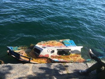 High angle view of abandoned boat on sea