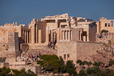 Low angle view of old ruins against clear sky