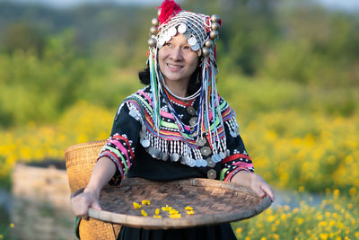 Woman sitting on field