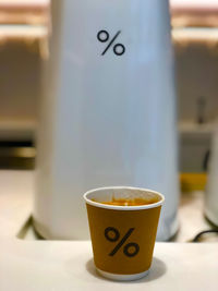 Close-up of coffee cup on table