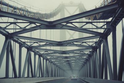 Car on chesapeake bay bridge during foggy weather