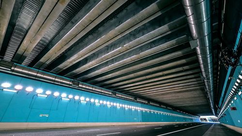 Low angle view of illuminated escalator