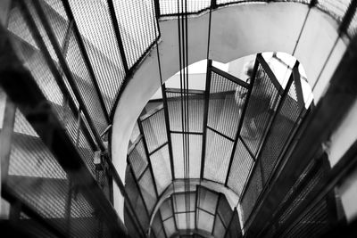 Low angle view of spiral staircase in building