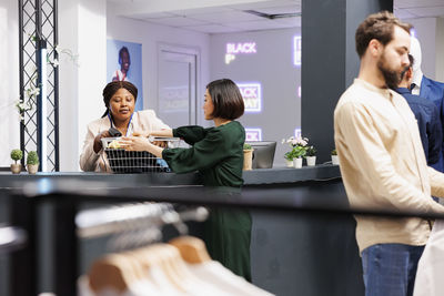 Side view of man working in office