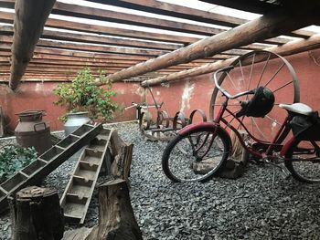 Bicycle parked against wall