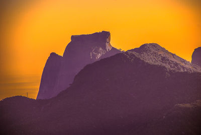Scenic view of multi colored rock during sunset