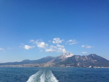 Scenic view of sea against blue sky