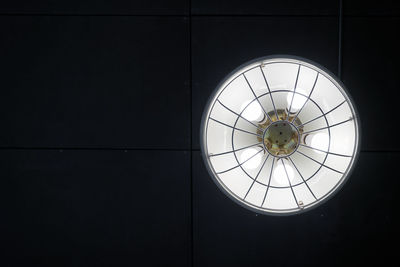 Low angle view of illuminated ceiling