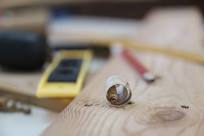 Close-up of machine on table