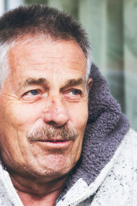 Close-up portrait of man wearing sunglasses