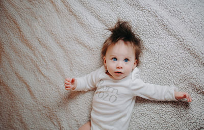 Portrait of cute baby at home