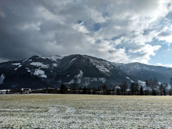 Scenic view of snowcapped mountains against sky