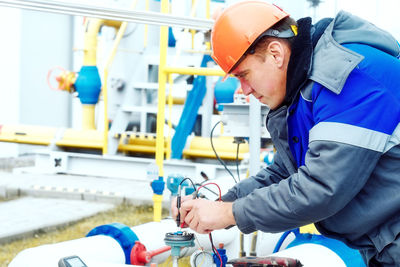 Architects working in factory