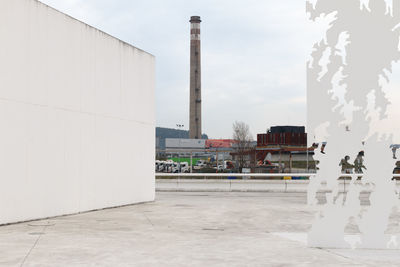 View of factory against sky