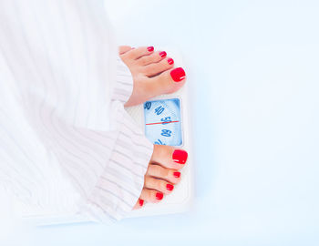 High angle view of woman against white background