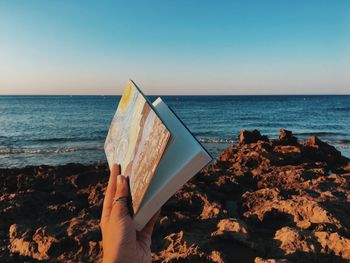 Scenic view of sea against clear sky