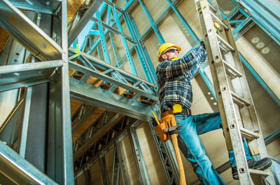 Low angle view of man standing in building