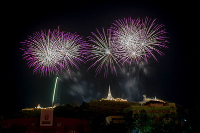 Firework display at night