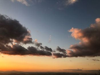 Low angle view of dramatic sky during sunset