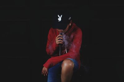 Man sitting in the dark