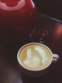 Close-up of coffee cup on table