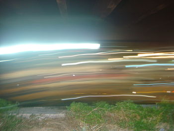 Scenic view of agricultural landscape against sky at night