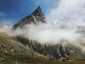 Scenic view of mountain range against sky