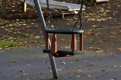 Empty swing in park