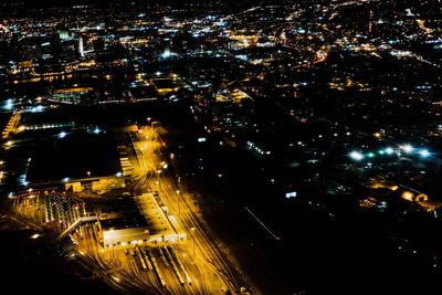 Aerial view of illuminated cityscape at night