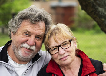 Close-up portrait of couple in park