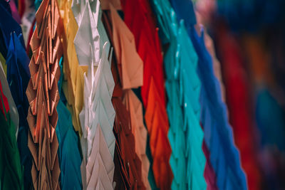 Full frame shot of multi colored flags hanging in market